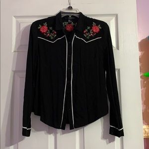 Black and white jersey with floral embroidery